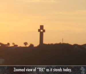 The Empty Cross Scultpure on a hill